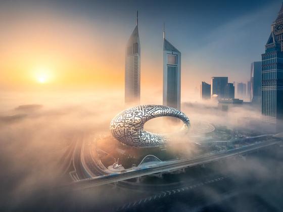 The Museum of the Future above morning fog